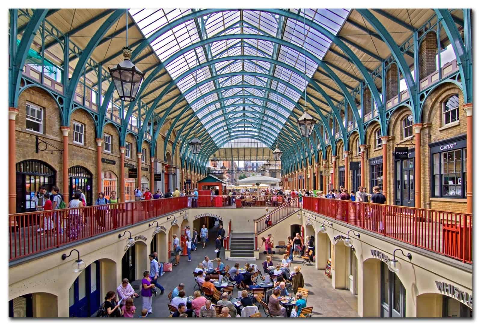 Covent Garden Market interior with people shopping and dining.
