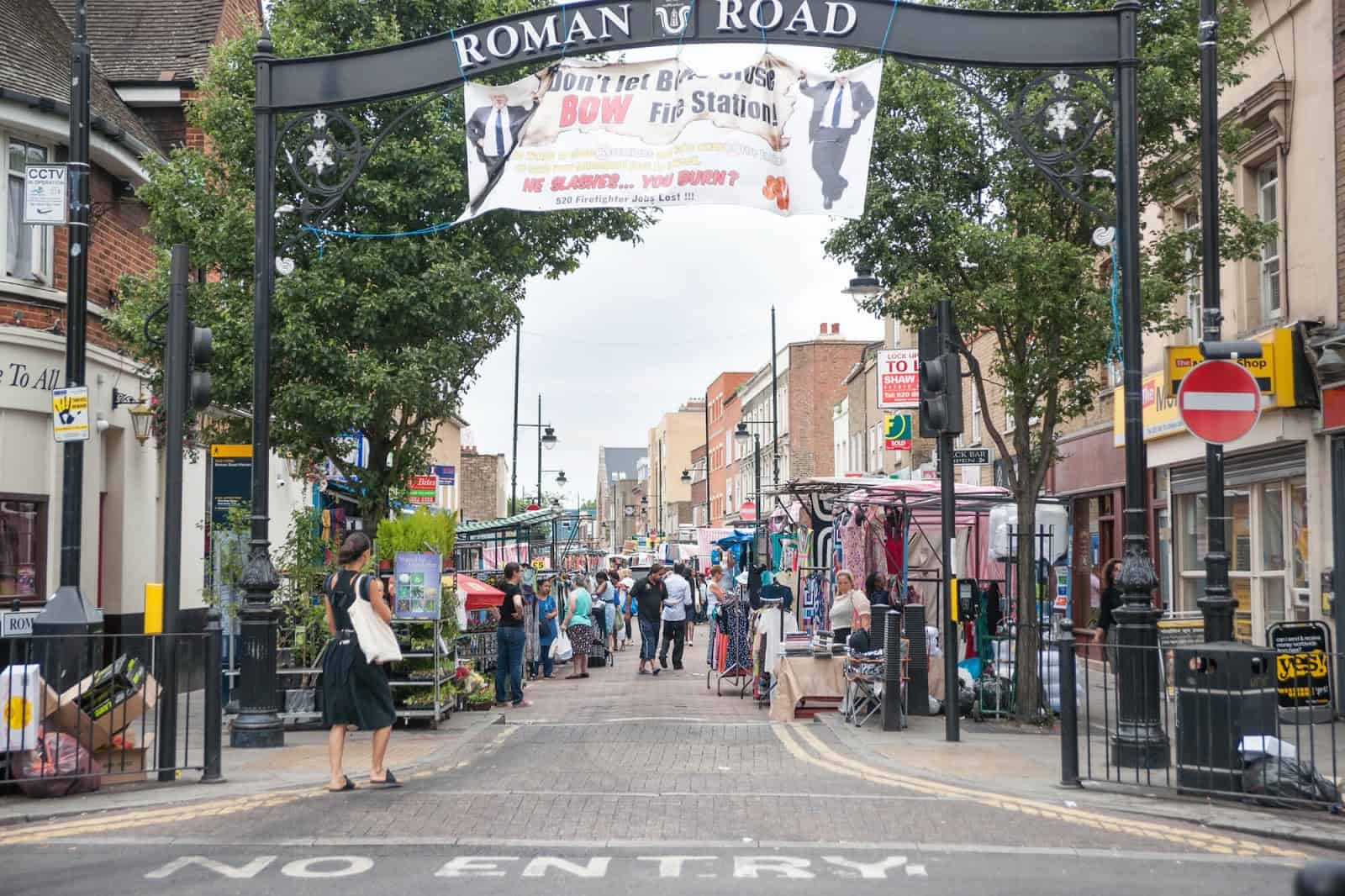 Roman Road Market street view with stalls and people.
